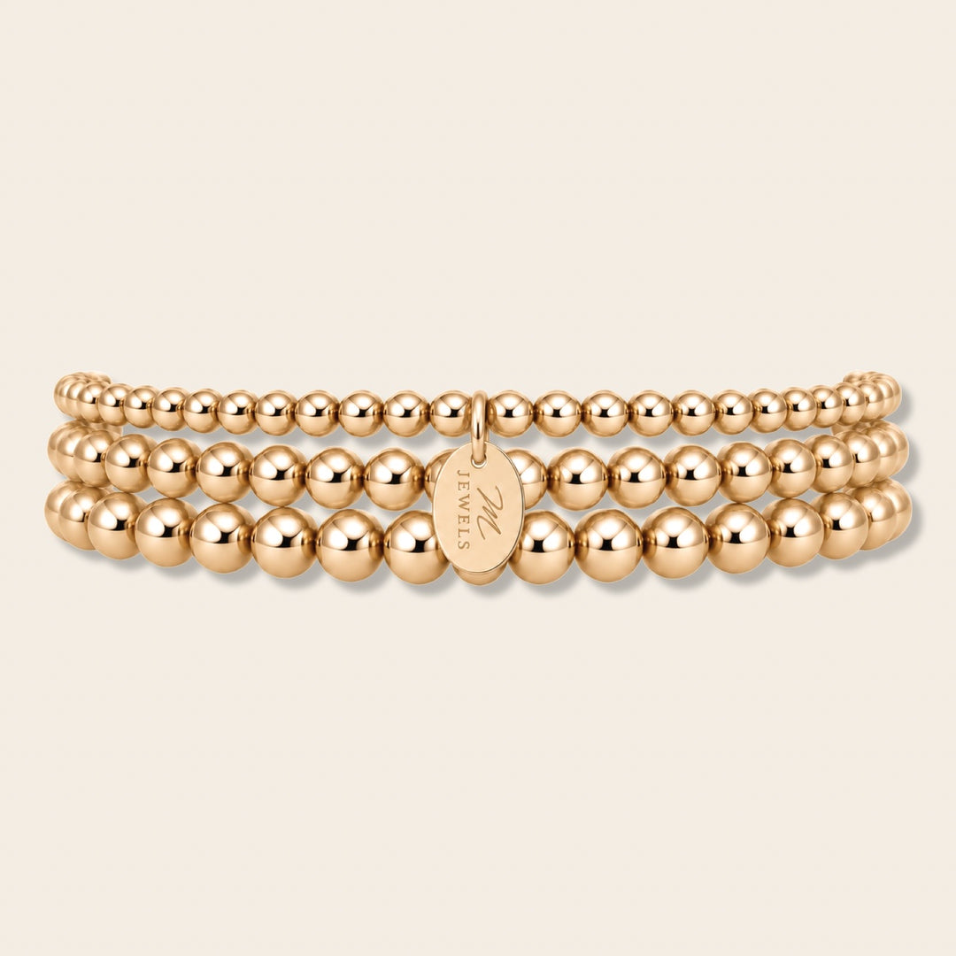 Signature Triple Stack – tři náramky z 14k gold filled kuliček 3, 4 a 5 mm s oválným medailonkem MJewels